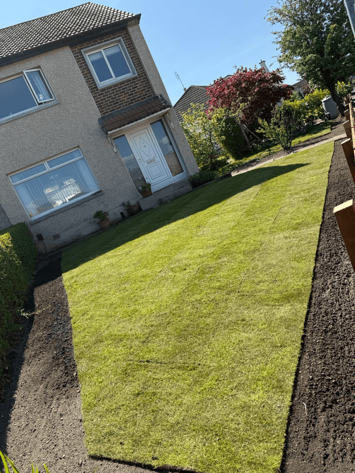 Turfing work in Airdrie and North Lanarkshire